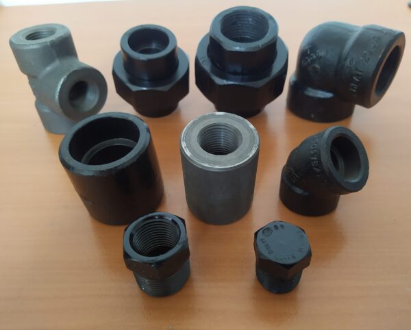 CONEXIONES DE ACERO AL CARBON FORJADO A-105 PARA 3000, 6000 Y 9000 LIBRAS ROSCADO Y SOCKET WELD